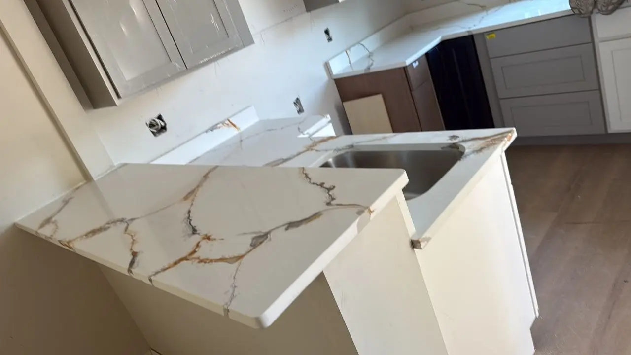 Gold-veined white countertop worktops with finished edge