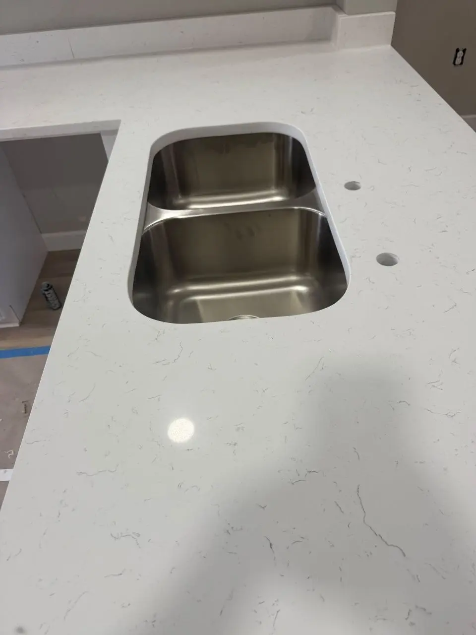 White quartz countertop with precision double-sink cutout
